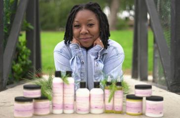Tianna Thompson pictured with her hair care products